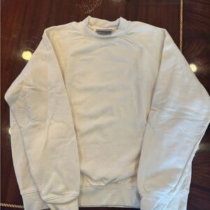 Unisex Essentials cream crewneck in perfect condition.
